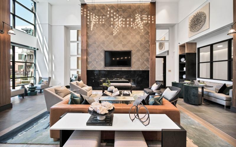 a club room with a fireplace