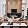 a clubhouse room with a couch, chairs and tables