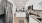 a kitchen with white cabinets