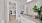 a bathroom with a shower, large sink and mirror