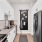 a kitchen with white cabinets