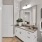 a bathroom with a mirror and a sink