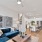 a living room with a blue couch